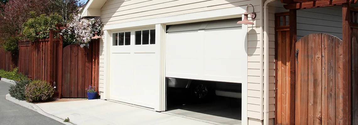 Fix Metal Garage Door Jerking in Jacksonville, Florida